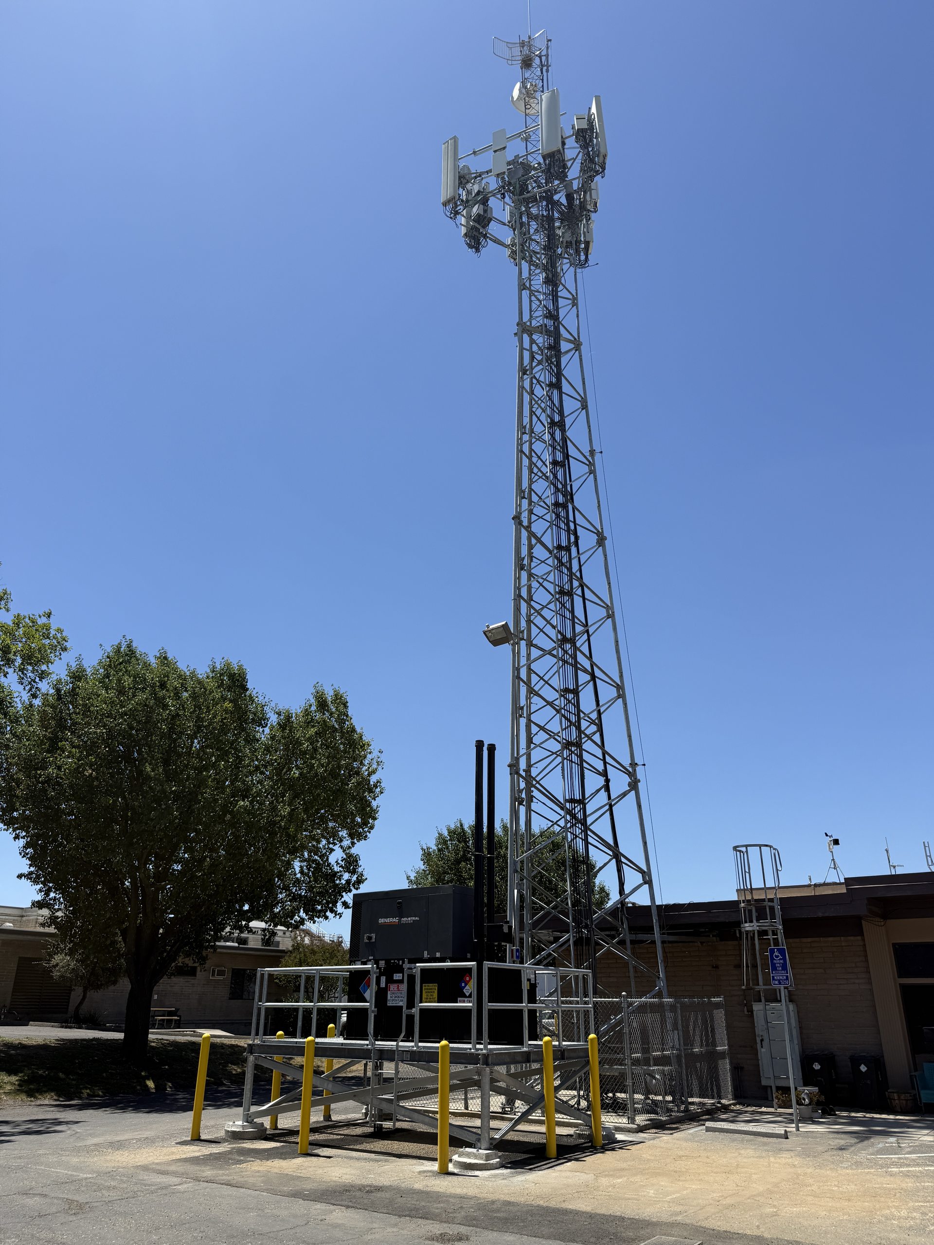 Full cell tower site with elevated generator platform built by JMES