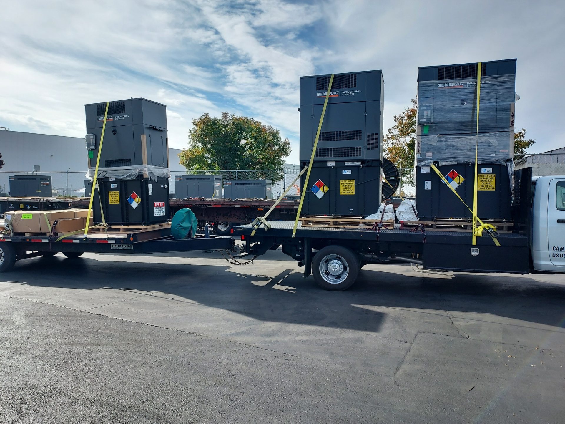 Generators strapped to a flatbed truck ready for deployment
